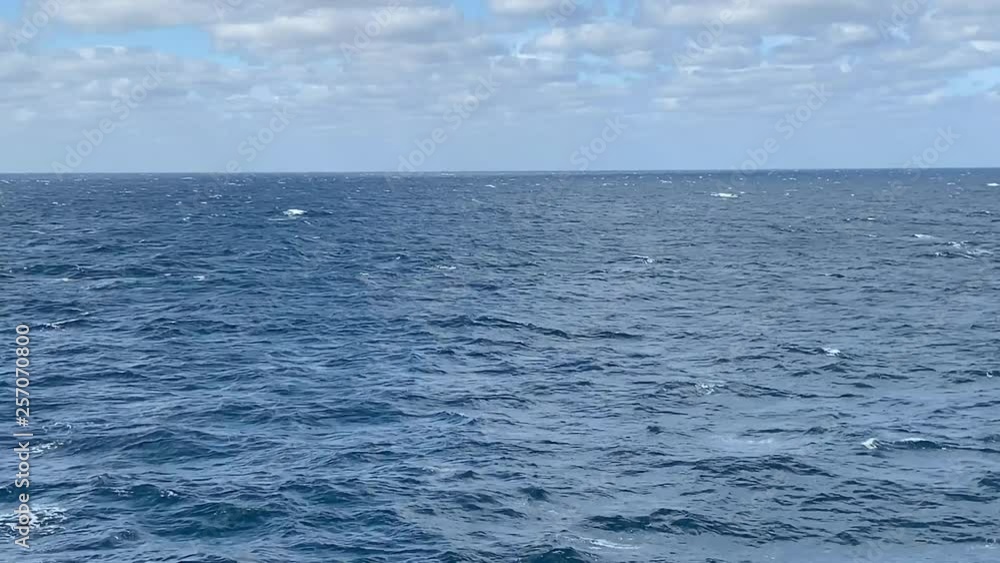 Somewhat rough open seas on a clear day water background with copy space Somewhat rough open seas on a clear day water background with copy space