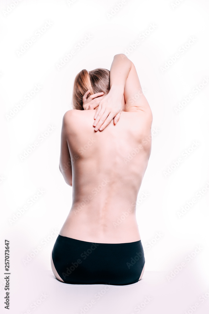 Obraz premium Beautiful naked woman back isolated on white background