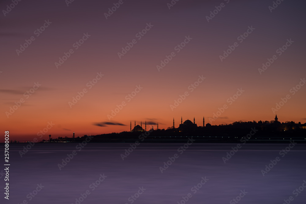 İstanbul cityscape at night, silhouette of mosque minarets