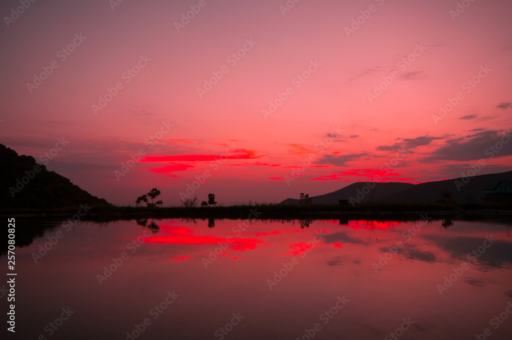 Beautiful clouds flying over the lake near mountains. Evening time shot over the clouds. Azerbaijan. Big Caucasus Beautiful clouds flying over the lake near mountains. Evening time shot over the clouds. Azerbaijan. Big Caucasus