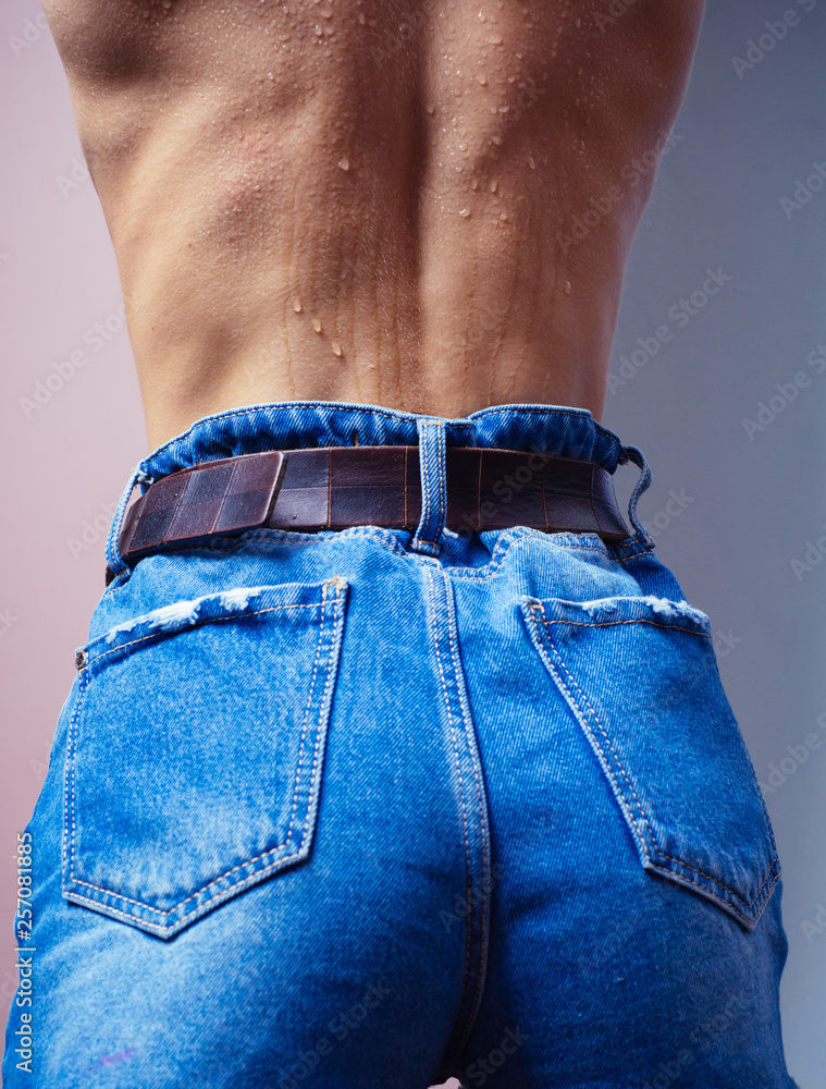 Woman wearing of jean pants from back. Female bottom in tight jeans. Ass girl dressed in Very sexy Stock Photo | Adobe