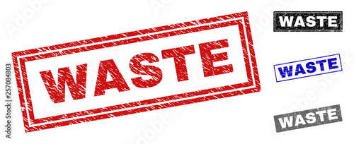 Grunge WASTE rectangle stamp seals isolated on a white background. Rectangular seals with grunge texture in red, blue, black and gray colors.