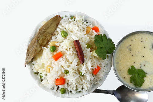 Indian food vegetable traditional cooked pulav rice or Basmati rice biryani with kadhi photo