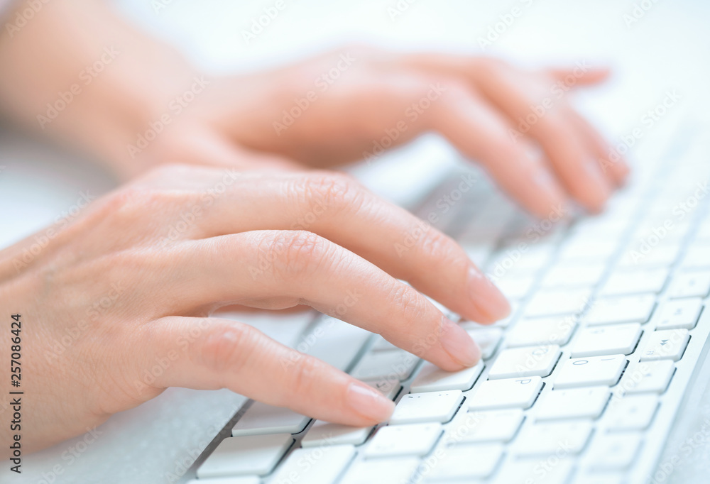 hands typing on laptop keyboard hands typing on laptop keyboard