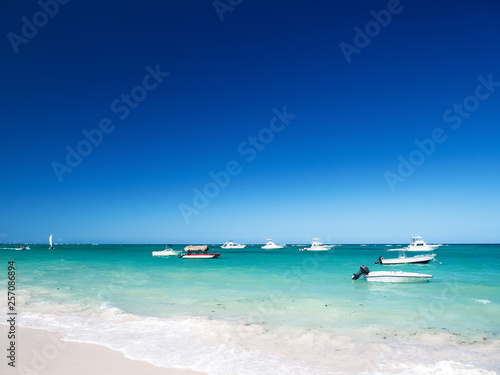 Boats and yachts floating in caribbean sea