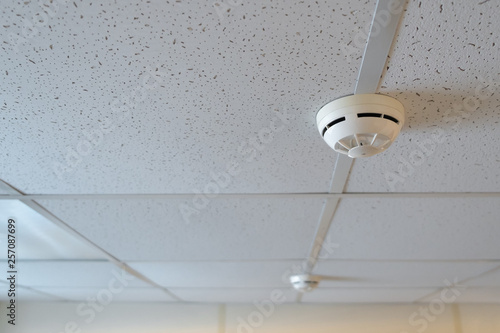 Fire alarm sensor hanging on the ceiling