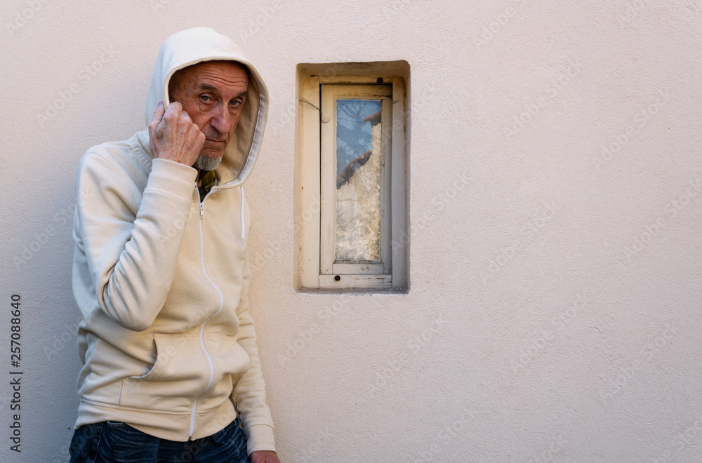 Burglar or thief or robber is checking the situation before break into house Burglar or thief or robber is checking the situation before break into house
