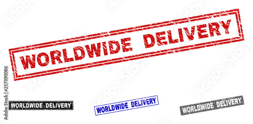 Grunge WORLDWIDE DELIVERY rectangle stamp seals isolated on a white background. Rectangular seals with grunge texture in red, blue, black and gray colors.