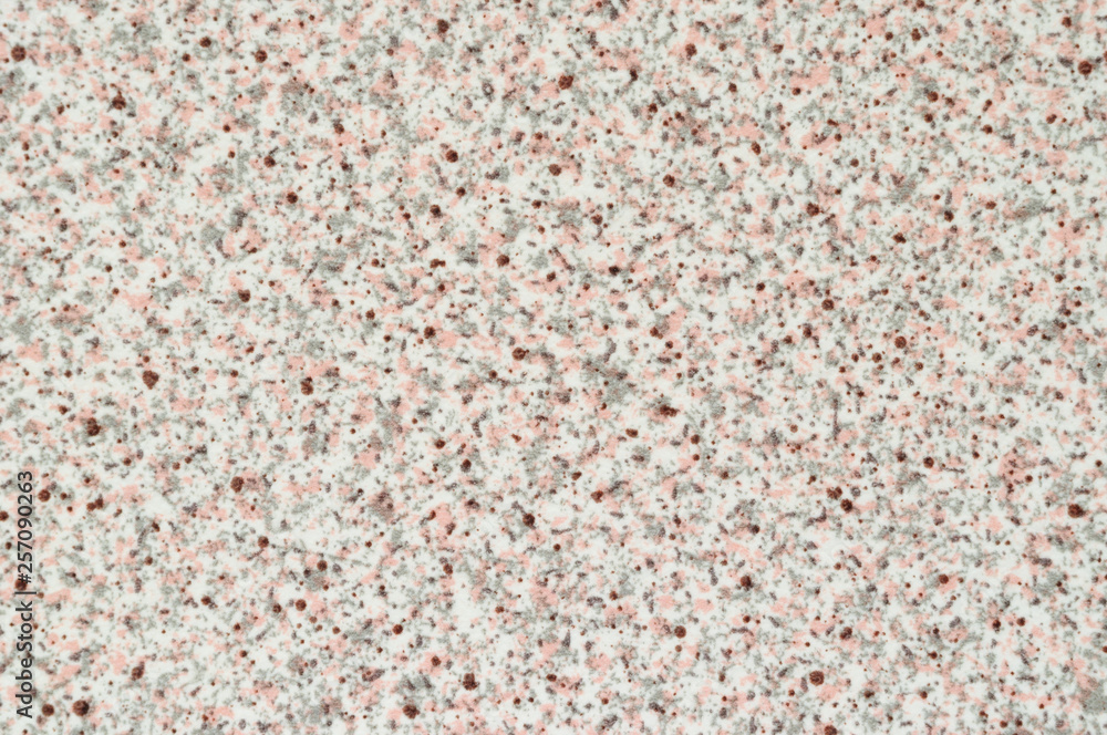 Texture of plastic with imitation of white stone with gray and pink inclusions. Texture of plastic with imitation of white stone with gray and pink inclusions.