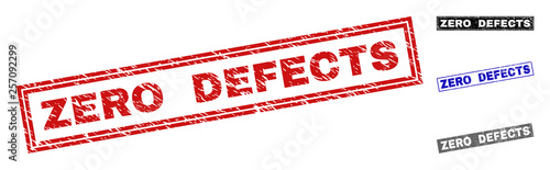 Grunge ZERO DEFECTS rectangle stamp seals isolated on a white background. Rectangular seals with grunge texture in red, blue, black and grey colors.