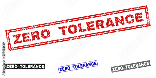 Grunge ZERO TOLERANCE rectangle stamp seals isolated on a white background. Rectangular seals with grunge texture in red, blue, black and gray colors.
