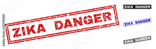 Grunge ZIKA DANGER rectangle stamp seals isolated on a white background. Rectangular seals with grunge texture in red, blue, black and gray colors.