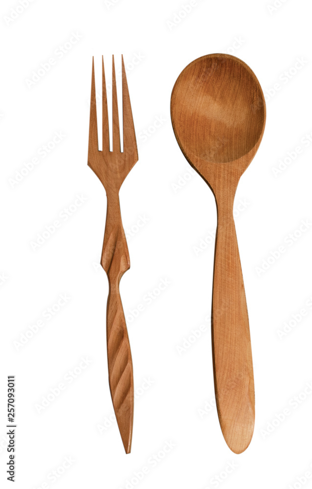 Wooden spoon and fork on white background. Isolated objects. Kitchen utensils. Tableware. Wooden spoon and fork on white background. Isolated objects. Kitchen utensils. Tableware.