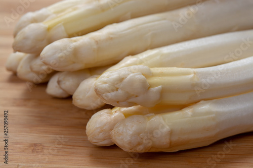 New harvest of white asparagus vegetable in spring season , washed white asparagus ready to cook, spring menu for restaurants