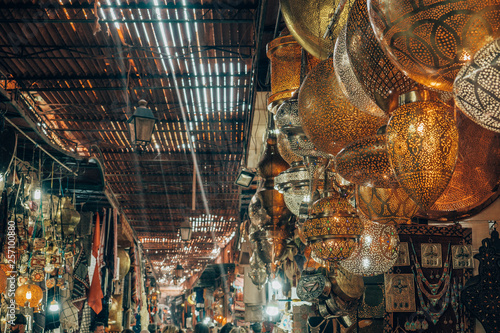 The famous oriental lamps of Morocco, hanging in one of the souks of the ancient medina of Marrakech.
