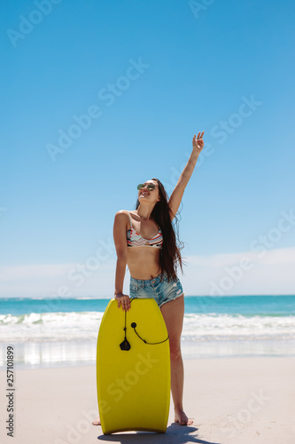 Photos Woman surfer enjoying bodyboarding