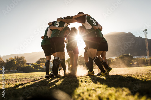 Rugby players rejoicing victory photo