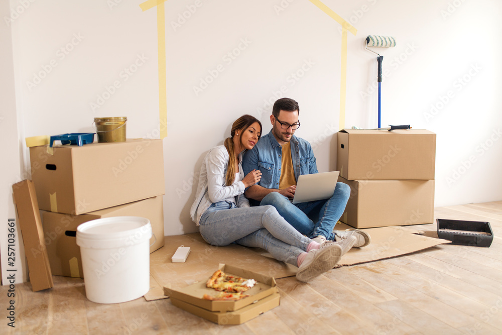 Happy couple in their new apartment. Happy couple in their new apartment.