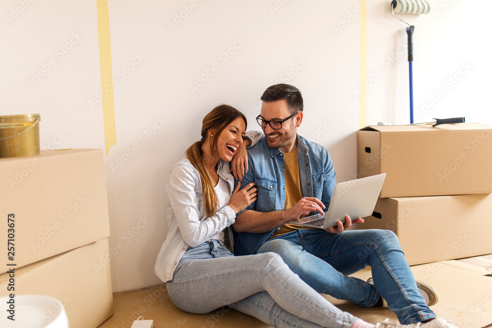 Happy couple in their new apartment. Happy couple in their new apartment.