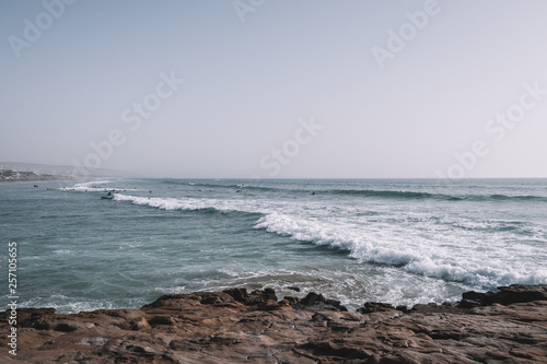 Surfers surfing the Waves of Taghazout at the West Coast of Morocco  Africa
