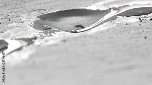 Drops of water fall from the plastered ceiling. Leak between floors of a house in need of repair.