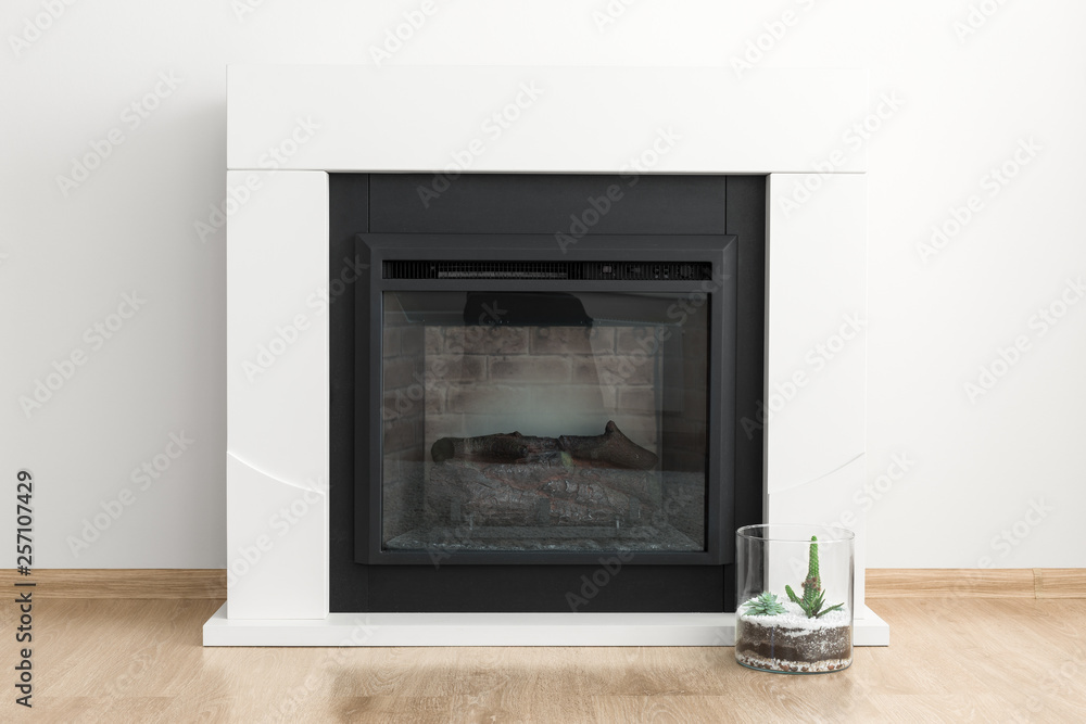 Apartment interior detail, modern fireplace Apartment interior detail, modern fireplace