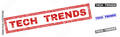 Grunge TECH TRENDS rectangle stamp seals isolated on a white background. Rectangular seals with grunge texture in red, blue, black and grey colors.