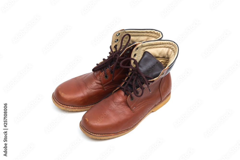 Male brown leather boot, footwear fashion isolated on white background.