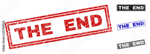 Grunge THE END rectangle stamp seals isolated on a white background. Rectangular seals with distress texture in red, blue, black and gray colors.