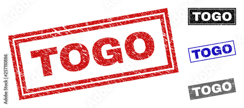 Grunge TOGO rectangle stamp seals isolated on a white background. Rectangular seals with grunge texture in red, blue, black and gray colors.