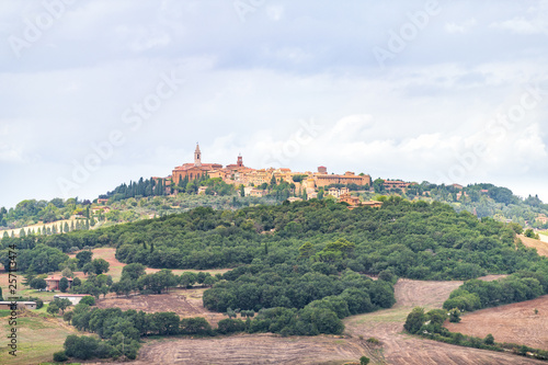 Pienza hilltop town and Italy Val D'Orcia countryside in Tuscany with lake and small village high angle cityscape