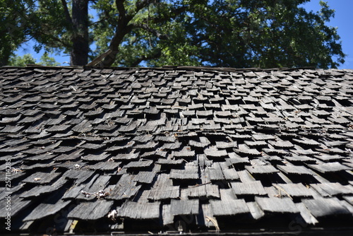 Oakhurst, CA., U.S.A. June 25, 2017. Restored Fresno Flats Historic Village and Park offers visitors a unique glimpse of California’s Sierra Nevada foothills pioneer 1870s dovetail hand-hewn log cabin