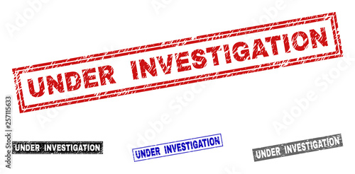 Grunge UNDER INVESTIGATION rectangle stamp seals isolated on a white background. Rectangular seals with grunge texture in red, blue, black and grey colors.