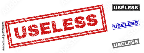 Grunge USELESS rectangle stamp seals isolated on a white background. Rectangular seals with grunge texture in red, blue, black and gray colors.