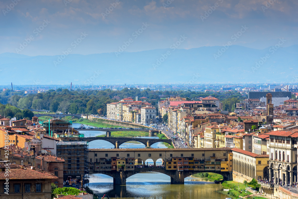 Ponte Vecchio Bridge and the Arno River in Florence , Italy