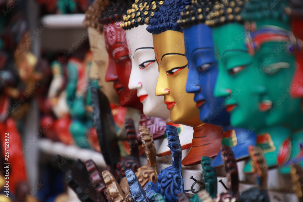 Thamel Kathmandu city, Nepal.Colorful Tradition wooden masks and handicrafts on sale at shop in the Thamel District of Kathmandu, Nepal - obrazy, fototapety, plakaty 