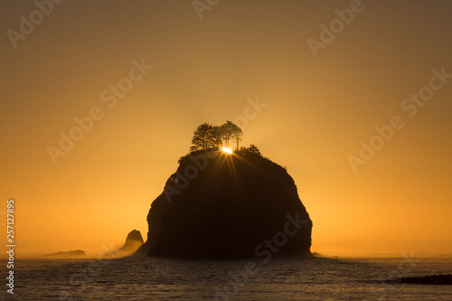 Beautiful warm Island silhouette on the ocean photo