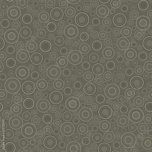 Seamless geometric pattern. Non-intersecting elements of a round shape, evenly distributed on a khaki background.