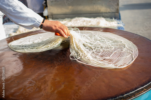 The making of Turkish desert Kadayif pastry photo