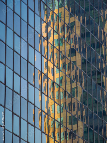 Skyscraper reflections on the windows in