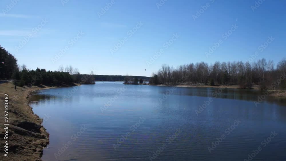 Lake in the park. Blue water. Spring in the park Lake in the park. Blue water. Spring in the park