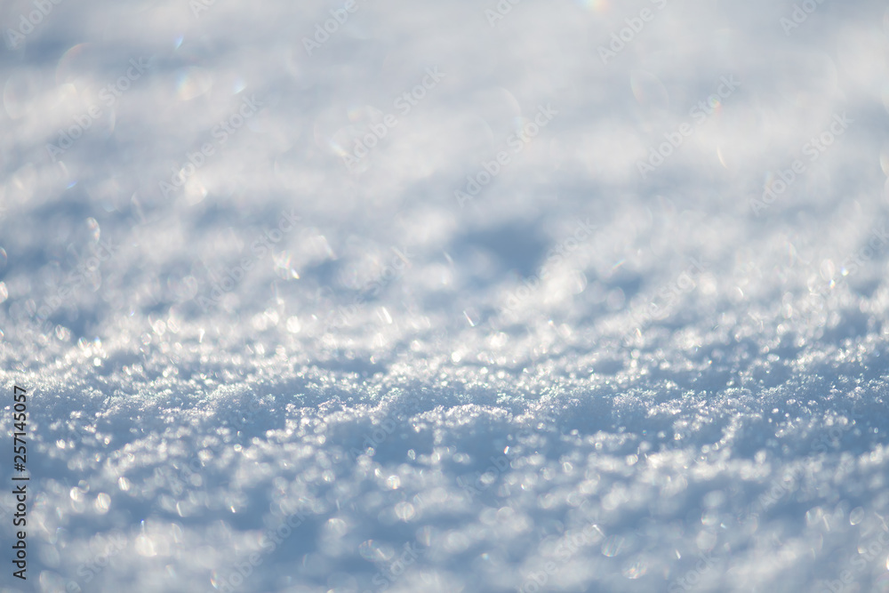 Fototapeta premium background of fresh snow texture in blue tone