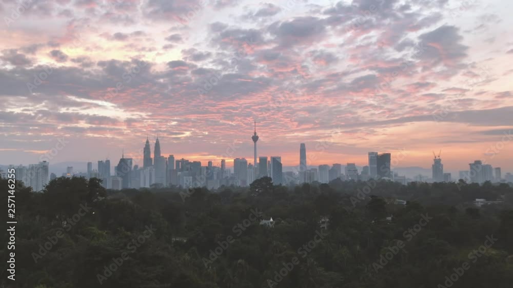 4k UHD establishing cinematic b-roll shot of sunrise scene at Kuala Lumpur city skyline. 4k UHD establishing cinematic b-roll shot of sunrise scene at Kuala Lumpur city skyline.