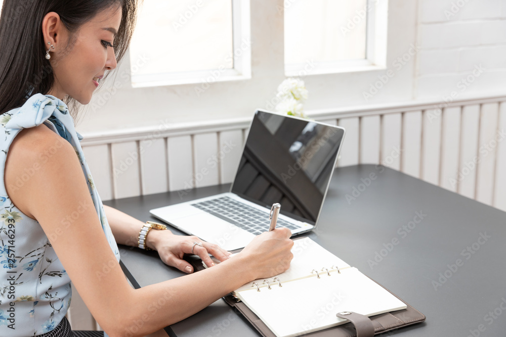 Fototapeta premium Freelancer business woman using computer laptop and credit cart to shopping online in cafe.