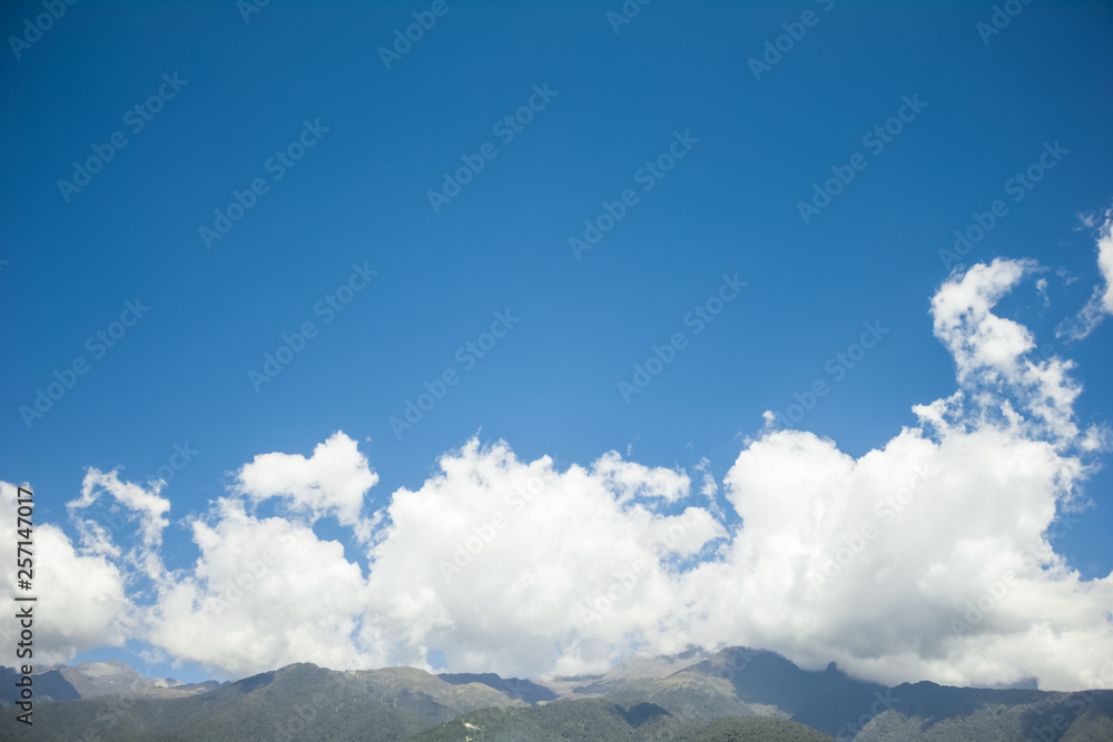 Los andes mountain landscape with big clouds and blue sky