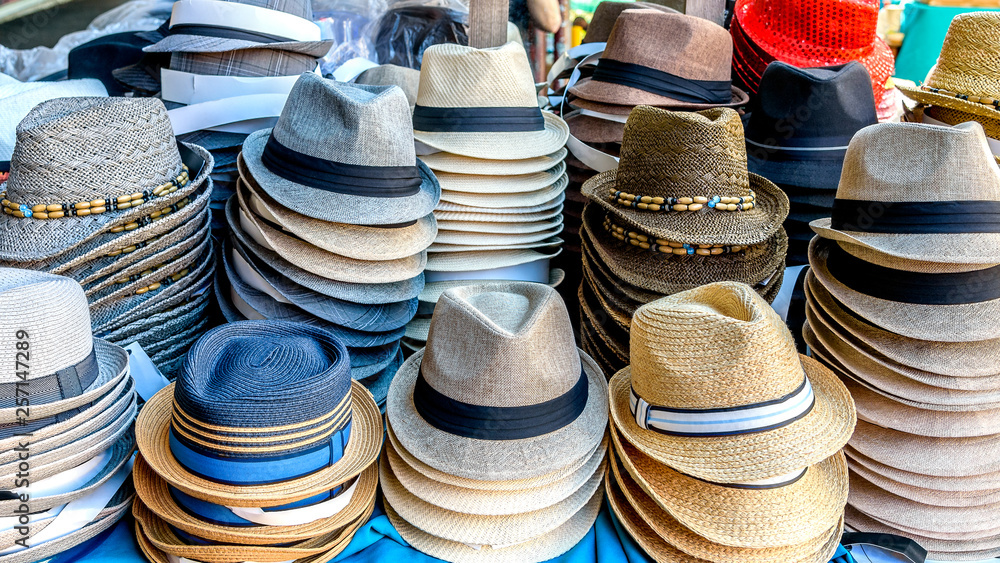 Many types of hats are on display at a market stall in Melbourne Australia.