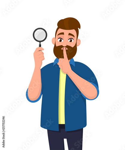 Attractive bearded young man holding magnifying glass and asking silence, keep quiet, shh, silence please! Search, find, discovery, analyze, inspect, investigation concept illustration in cartoon.