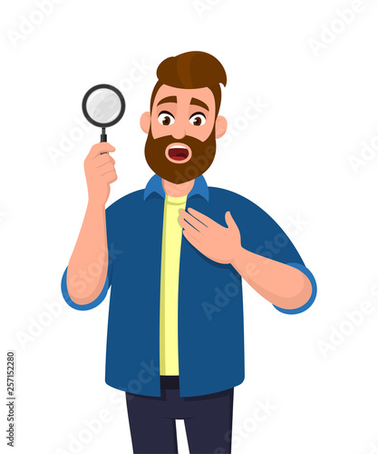 Shocked young man holding/showing magnifying glass and holding hand on chest. Search, find, discovery, analyze, inspect, investigation, human emotion concept illustration in vector cartoon flat style.