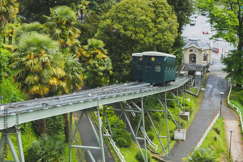 Funicular cars traveling on tracks in downtown Pau, France