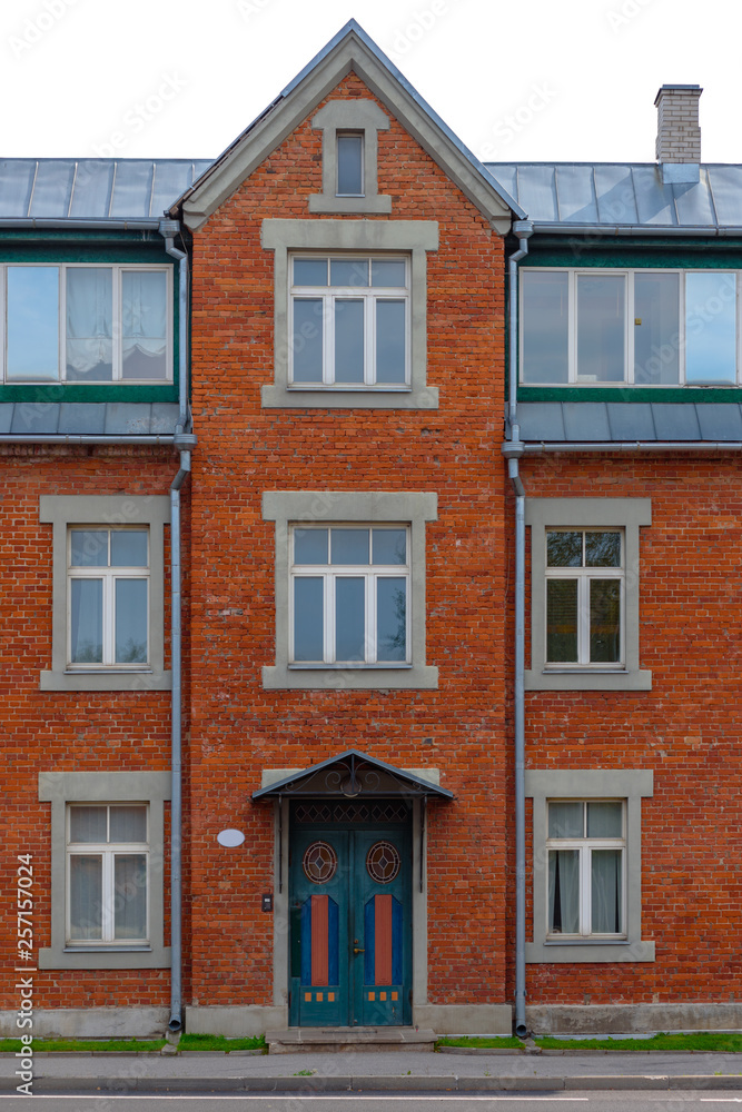 Exterior of modern appartment building made of red brick